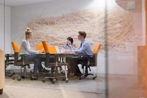 Business Team At A Meeting at modern office building photo