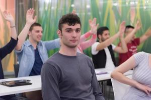 students group raise hands up photo