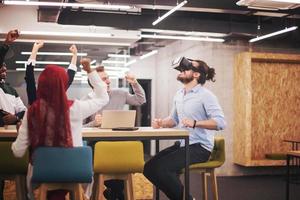 Young Multiethnic Business team using virtual reality headset photo