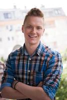 man standing at balcony photo