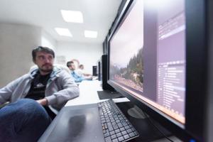 photo editor at his desk