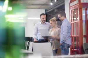 Business team Working With laptop in creative office photo