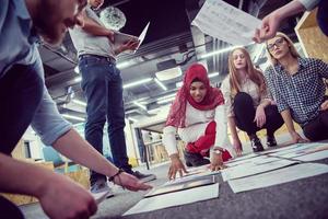 black muslim woman having meeting with Multiethnic  startup business team photo