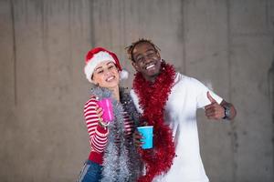 young multiethnic business couple celebrating new year party photo