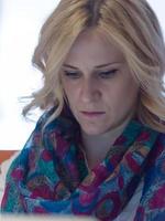 Businesswoman typing on phone  in office photo