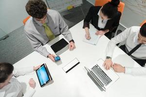 aerial view of business people group brainstorming on meeting photo