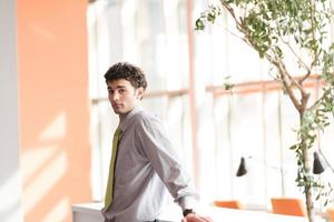 portrait of young business man at office photo