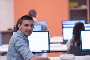 technology students group working in computer lab school  classroom photo