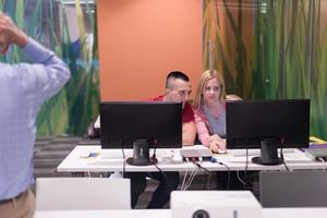 teacher and students in computer lab classroom photo