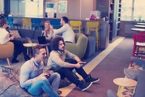 startup Office Workers Playing computer games photo