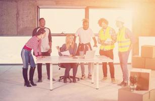 multiethnic business people on construction site photo