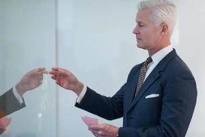 senior business man making plans with sticker photo