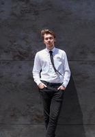 portrait of startup businessman in a white shirt with a tie photo