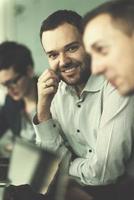 Business Team At A Meeting at modern office building photo