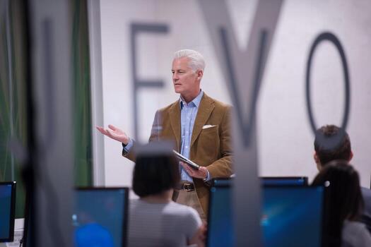 teacher and students in computer lab classroom photo