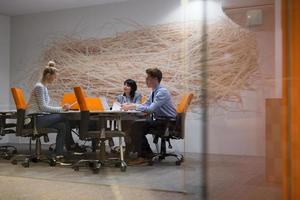 Business Team At A Meeting at modern office building photo