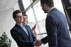 cloasing the deal in modern office interior photo