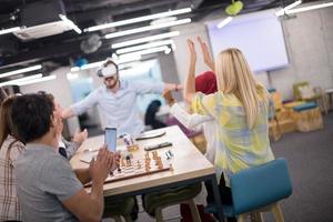 Young Multiethnic Business team using virtual reality headset photo