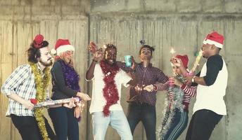 multiethnic group of casual business people having confetti party photo