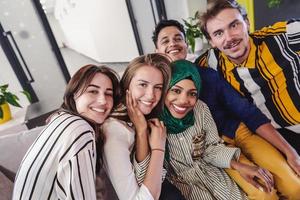 group of casual multiethnic business people taking selfie photo