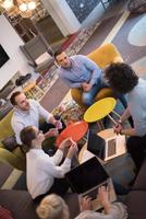 Startup Business Team At A Meeting at modern office building photo