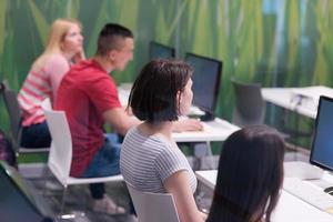 teacher and students in computer lab classroom photo