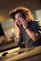 businessman relaxing at the desk photo