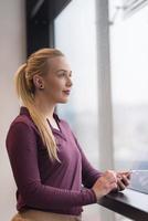 business woman using smart phone at office photo