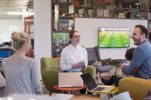 Startup Business Team At A Meeting at modern office building photo