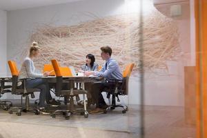 Business Team At A Meeting at modern office building photo
