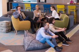 startup Office Workers Playing computer games photo