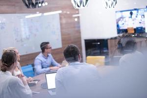 Startup Business Team At A Meeting at modern office building photo