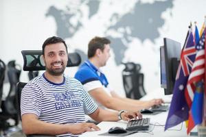 two male software developers working on computer photo