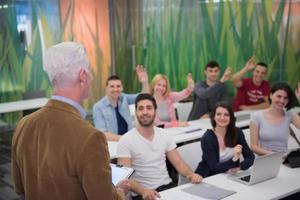 students group raise hands up photo