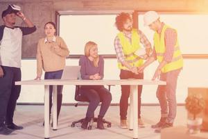 group of multiethnic business people on construction site photo