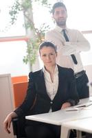 portrait of business couple at office photo