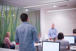 student answering a question in classroom photo