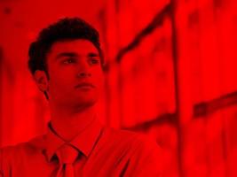 portrait of young business man at modern office photo