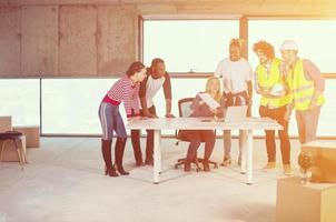 multiethnic business people on construction site photo