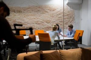 Business Team At A Meeting at modern office building photo