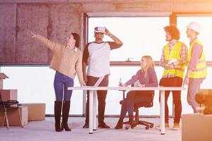 group of multiethnic business people on construction site photo