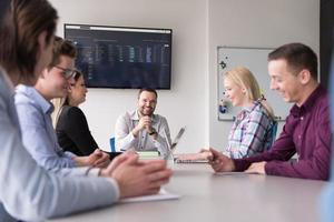 Business Team At A Meeting at modern office building photo