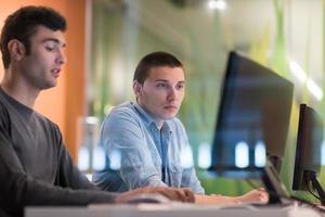 technology students group working  in computer lab school  classroom photo