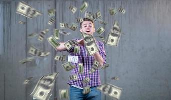 businessman making the rain of money photo