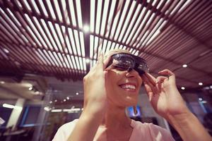 man using virtual reality gadget computer glasses photo