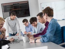 Business Team At A Meeting at modern office building photo