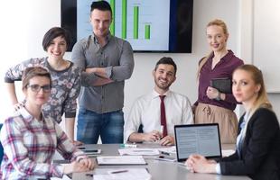 portrait of business people group at modern office meeting room photo