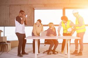 group of multiethnic business people on construction site photo