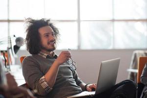 businessman working using a laptop in startup office photo