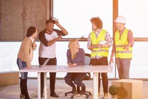 group of multiethnic business people on construction site photo